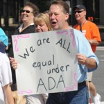 We Are All Equal Under ADA 2010 protest sign