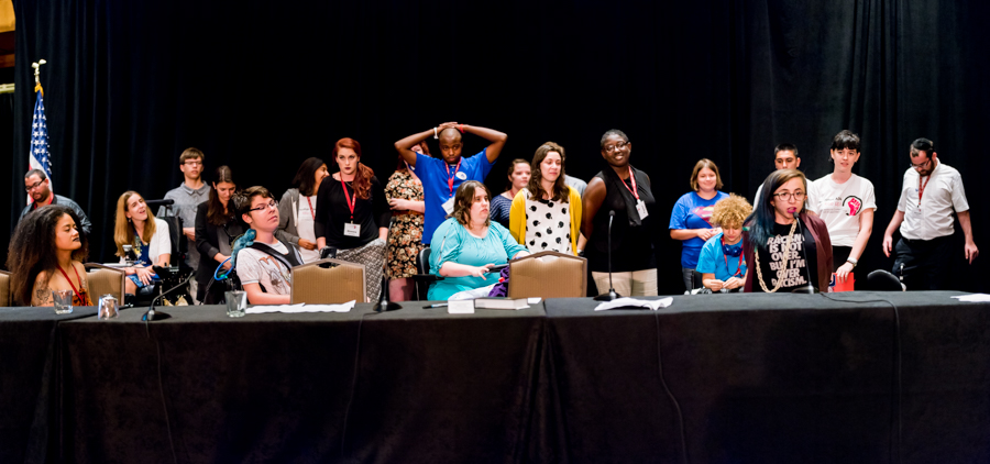 NCIL Youth speak on stage at the 2015 Conference on Independent Living